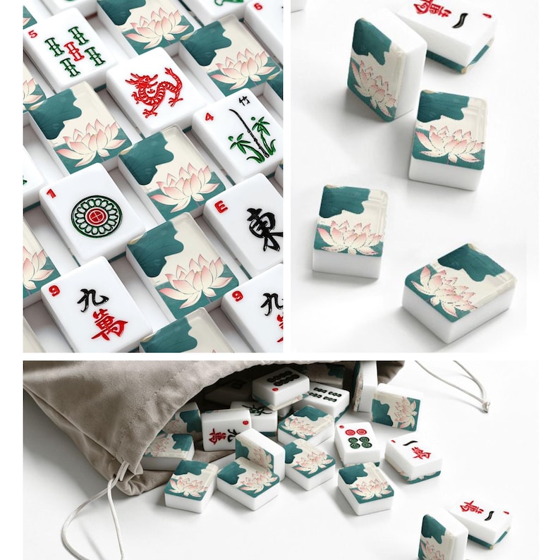 May include: A collection of white mahjong tiles featuring various red, green, and black ink illustrations including lotus flowers, bamboo, dragons, and Chinese characters. Some tiles are arranged in a grid, while others are scattered near a bag.