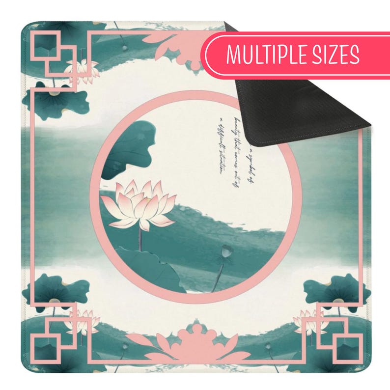 May include: A square mat featuring a cream-coloured background with a central pink circle containing a pink lotus flower and dark green leaves. The border has a pink geometric frame. Text within the circle reads, a symbol of beauty that comes out of a difficult situation.