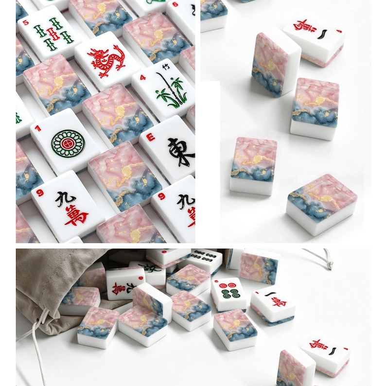 May include: A collection of rectangular Mahjong tiles featuring white faces with black, red, and green traditional symbols and characters. The backs of the tiles display a marbled pattern in shades of pink, blue, and gold. A beige drawstring bag is included.