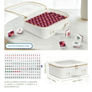 May include: A white rectangular storage case with a clear top window and handle, containing mahjong tiles with a red and purple abstract pattern. The set includes 36 dots, 36 bams, 36 cracks, 12 dragons, 16 winds, 16 flowers, 18 jokers, and 4 blank tiles.