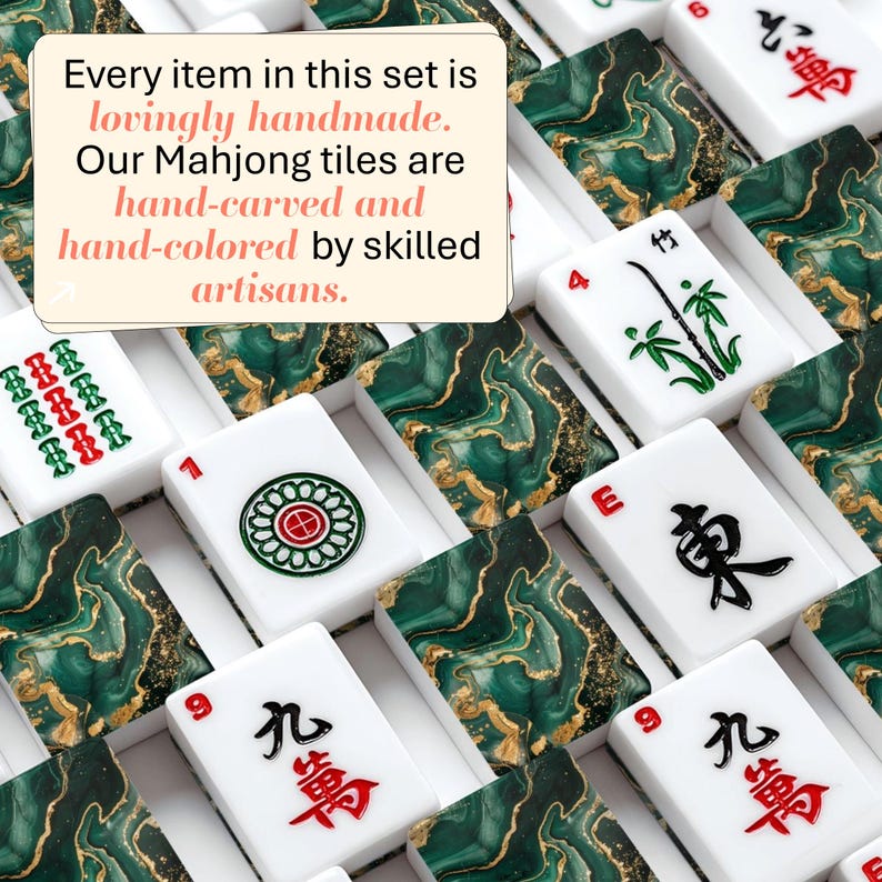 May include: A collection of Mahjong tiles featuring a white base with green and gold marbled patterns on the back. The front faces display black, red, and green engraved symbols, numbers, and characters. A text overlay reads: Every item in this set is lovingly handmade. Our Mahjong tiles are hand-carved and hand-colored by skilled artisans.