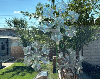 Pegatinas de ventana con copos de nieve de invierno: vinilos reutilizables para atrapar el sol y decorar con nieve y frío.