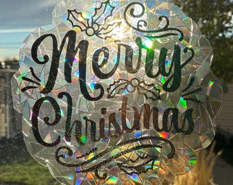Vinilo navideño para ventana: Atrapasol reutilizable «Feliz Navidad»