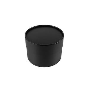 May include: A solid black round gift box with a matching lid. The box is cylindrical and appears to be made of cardboard or a similar material. The box is empty and ready to be filled with a gift.