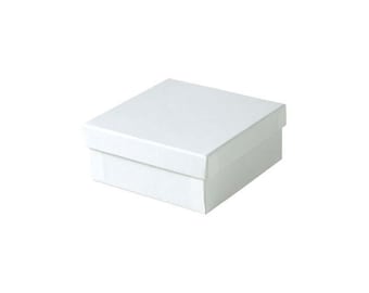 May include: A white cardboard box with a square shape and a smooth surface.