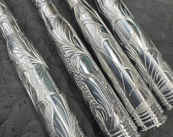 Polished hand engraved bullet antennas