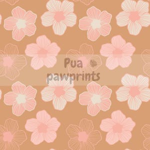 May include: A repeating pattern of stylized pink flowers with white centers on a tan background. The flowers have a delicate, outlined design. The text "Pua pawprints" is centered horizontally in a darker tan band.