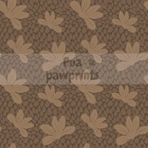 May include: A repeating pattern featuring stylized tan-colored floral shapes on a textured brown background. The background has a pebble-like appearance. The text "Pua & pawprints" is overlaid on the image.