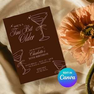May include: A brown invitation card with the text "She's a Tini Bit Older" and "Charlotte's 30th Birthday". The card features martini glass illustrations and the "Edit in Canva" logo. A peach-colored flower is in the background.