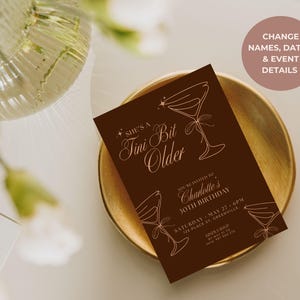 Editable espresso martini themed birthday invitation in brown, Tini Bit Older 5x7 Canva template with martini glass design for women’s 20s and 30s milestone party.