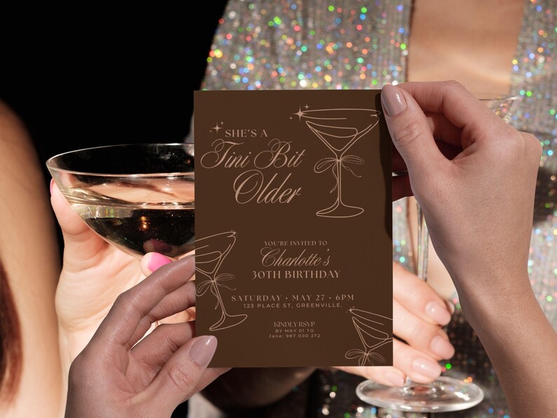 Modern brown cocktail-themed Tini Bit Older birthday invitation with martini glasses, editable 5x7 Canva template for espresso martini lovers’ parties.