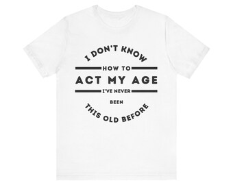 Fun 'Act My Age' T-shirt with humorous quote, trendy top for all ages, bestseller on Etsy, cool birthday gift, unique & playful tee