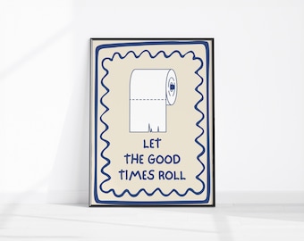 May include: A framed art print featuring a white toilet paper roll illustration on a beige background. The text "LET THE GOOD TIMES ROLL" is below the illustration. The artwork is framed with a black frame and a blue wavy border.
