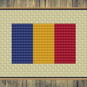 May include: A framed cross-stitch of the Romanian flag. The flag is made up of three vertical stripes: blue, yellow, and red.