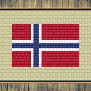 Puede incluir: Un punto de cruz enmarcado de la bandera noruega. La bandera es roja con una cruz azul y un borde blanco.