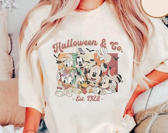 ヴィンテージ ディズニー ハロウィーン & Co 1928 シャツ、ミッキーと仲間たちのハロウィーン コスチューム T シャツ、ミッキーのそれほど怖くないパーティー 2025、マジック キングダム