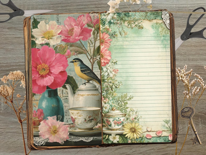 May include: Open book with floral illustrations and a bird perched on a teapot. The left page features a teal vase with pink flowers, a teapot, and a teacup. The right page has lined paper with floral accents. A vintage key and scissors are on the wooden surface.