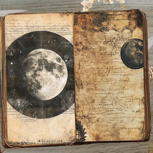 May include: An open, antique-style book with aged, textured pages. One page features a detailed illustration of the moon against a starry background. The other page has handwritten script. Decorative elements include scissors, a key, and dried flowers.