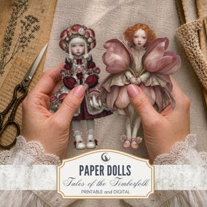 May include: Two detailed paper dolls are held in hands, one in a burgundy dress with mushroom accents and the other in a pink floral dress. The dolls are part of the "Tales of the Timberfolk" collection, available as printable and digital files.