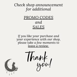 May include: Black and white image with a crescent moon and a cat sitting on it. The text reads "Check shop announcement for additional PROMO CODES and SALES. If you like your purchase and your experience with our shop, please take a few moments to leave a review. Thank you!"