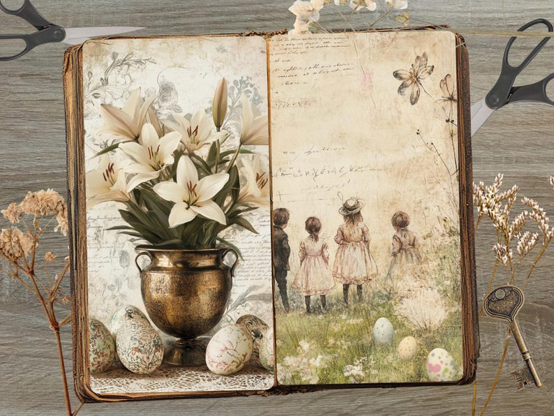 May include: An open vintage book with a bouquet of white lilies in a gold vase on the left page. The right page features a watercolor illustration of children in a field with a handwritten inscription. The book is surrounded by decorative elements like scissors, keys, and dried flowers.