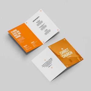 May include: Two open brochures with orange and white pages. One brochure has the text "TO KNOW JESUS AND MAKE HIM KNOWN" and the other reads "CHRIST CHURCH". The brochures are on a light grey background.