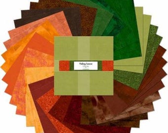 May include: A collection of fabric squares in autumnal colors, arranged in a circular pattern. The color palette includes shades of green, brown, orange, and red. A central square displays the text "Falling Leaves".