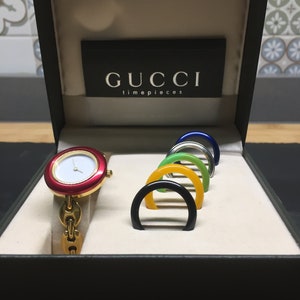silver gucci bezel watch
