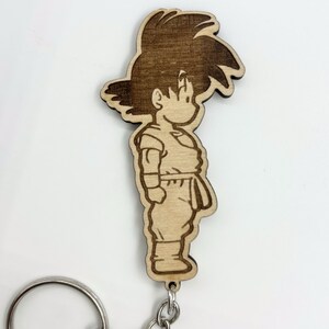 Porte-clés mural Kame House avec porte-clés Goku et Chichi de Dragon Ball Z Goku