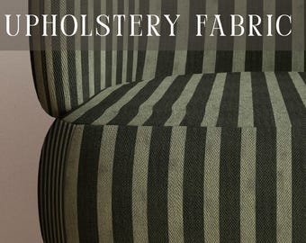 May include: A chair upholstered in a fabric featuring vertical stripes in alternating shades of dark olive green and muted sage green. The text PREMIUM UPHOLSTERY FABRIC is displayed at the top, and APOSTROFO DESIGN is printed at the bottom.