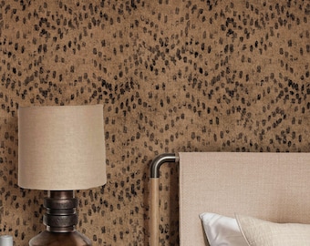 May include: A bedroom scene featuring a patterned wallpaper in shades of brown and black. A bedside table with a lamp and a bed with a beige headboard and white bedding are visible. The text "APOSTROFO DESIGN" is at the bottom.