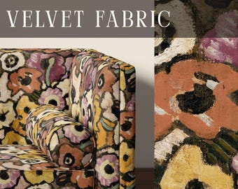 May include: Upholstery velvet fabric featuring a bold, painterly floral pattern in shades of orange, yellow, purple, and black. The fabric covers a sofa with a cylindrical bolster pillow. Text reads UPHOLSTERY VELVET FABRIC and APOSTROFO DESIGN.