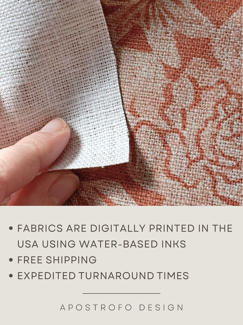May include: A piece of white fabric with a visible grid-like weave texture is held over a larger piece of fabric featuring a terracotta-coloured floral pattern. The text on the image reads: FABRICS ARE DIGITALLY PRINTED IN THE USA USING WATER-BASED INKS.