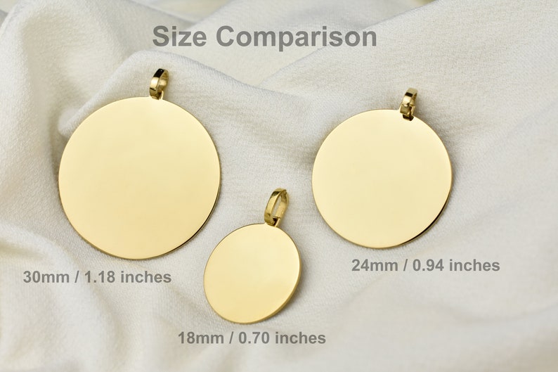 May include: Three gold-colored circular pendants with attached bails, labeled Size Comparison. The pendants measure 30mm (1.18 inches), 24mm (0.94 inches), and 18mm (0.70 inches) in diameter, showcasing a smooth, reflective, and flat surface design.