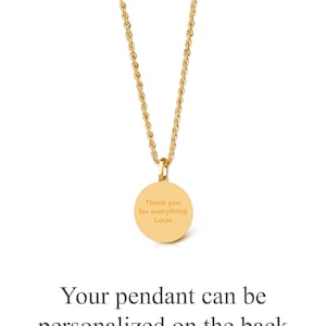 May include: A gold-toned rope chain necklace featuring a circular pendant. The pendant is engraved with the text "Thank you for everything Lucas". The text "Your pendant can be personalized on the back with a custom message" is printed below the necklace.
