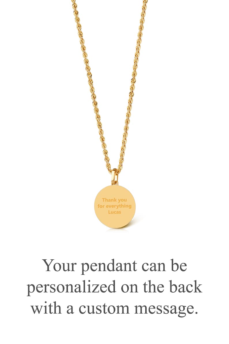 May include: A gold-toned rope chain necklace featuring a circular pendant. The pendant is engraved with the text "Thank you for everything Lucas". The text "Your pendant can be personalized on the back with a custom message" is printed below the necklace.