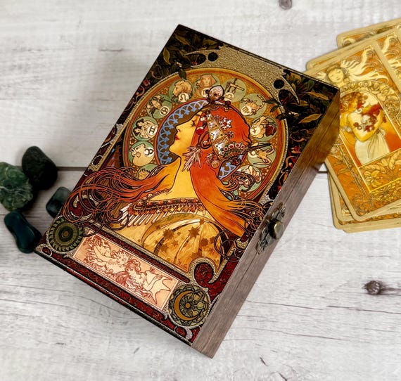 Laser-engraved wooden keepsake box featuring Alphonse Mucha's iconic Art Nouveau zodiac art — a genuinely beautiful collision of fine art history and personalized craft.