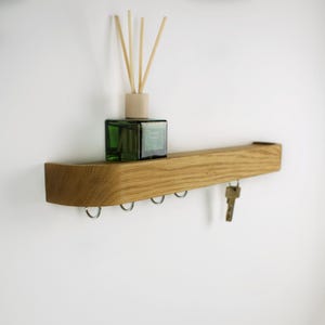 Solid oak entry way key holder with hooks and magnets, simple coat rack for decorating hallway walls and keeping an organized mudroom