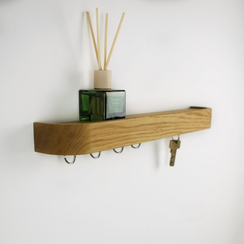 Solid oak entry way key holder with hooks and magnets, simple coat rack for decorating hallway walls and keeping an organized mudroom