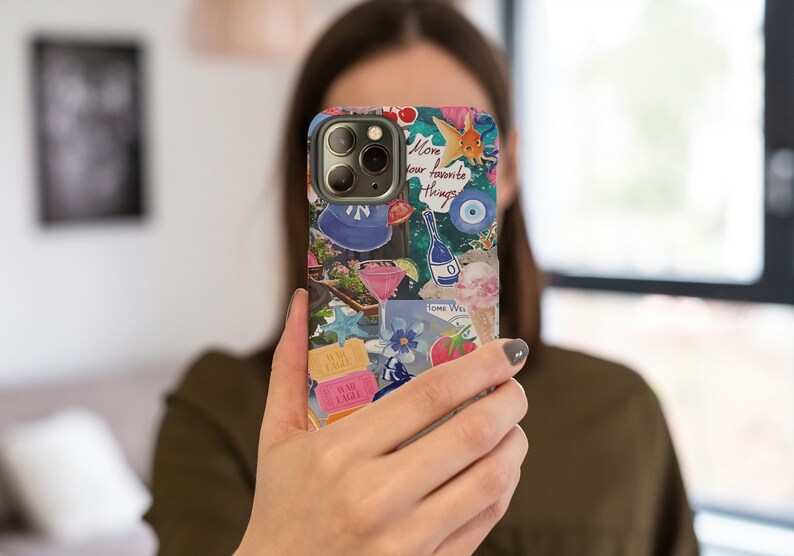 May include: A colorful phone case with a variety of images and text, including "Love your favorite things".