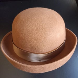Vintage brown woolen bowler hat