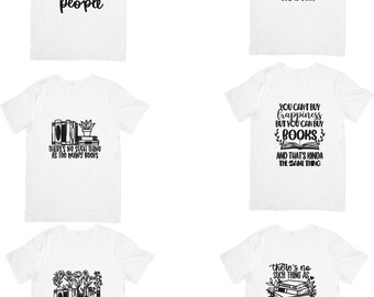 May include: White t-shirts with black text and graphics. Designs include phrases like "I like books more than I like people," "Just one more chapter," and "There's no such thing as too many books." Other designs feature stacks of books.