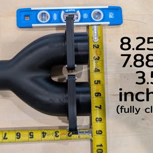 Gate Valve Y Splitter with measuring tapes to show its measurements