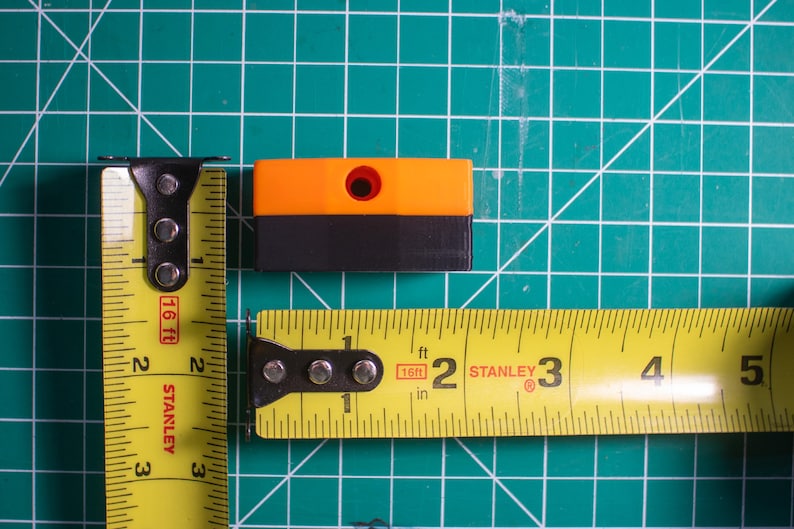 Ridgid bit holder with measuring tapes to show its measurements