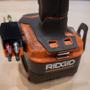 The other side of the bit holder showing four more bits attached to it