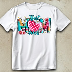 May include: White t-shirt with a colorful graphic that says "Best Mom Ever" with a pink heart with white polka dots in the center.