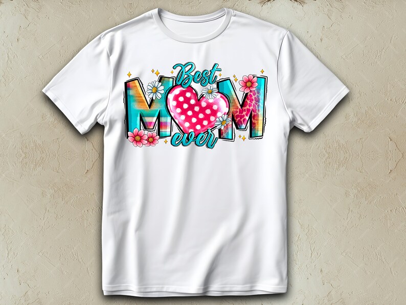 May include: White t-shirt with a colorful graphic that says "Best Mom Ever" with a pink heart with white polka dots in the center.