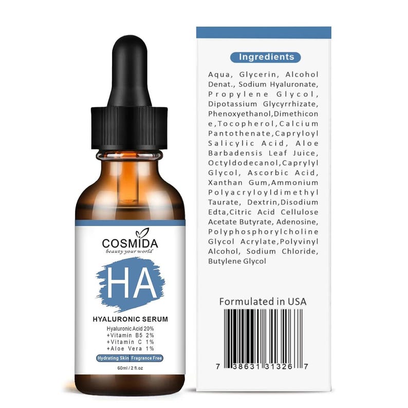 May include: A brown glass bottle of COSMIDA hyaluronic serum with a black dropper. The label features the letters "HA" in a blue box, and lists ingredients and volume: 2 fl oz. The product is formulated in the USA.