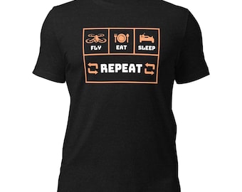 May include: Black t-shirt with an orange graphic that says "Fly, Eat, Sleep, Repeat" in a box.