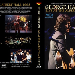 May include: A Blu-ray disc case for a live concert recording of George Harrison performing at the Albert Hall in 1992. The cover features a black and white photo of George Harrison playing a guitar on stage. The text on the cover reads "George Harrison Live at the Albert Hall 1992".